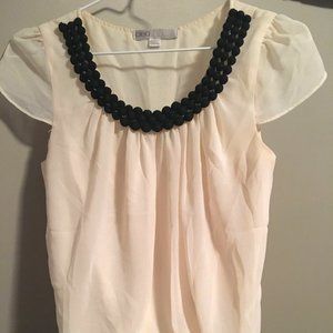 White blouse, Black detail